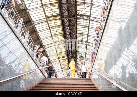 Lviv, Ukraine - July 30, 2018: Inside architecture of Lvov train station platform with crowd of people waiting in historic Ukrainian city in summer, c Stock Photo