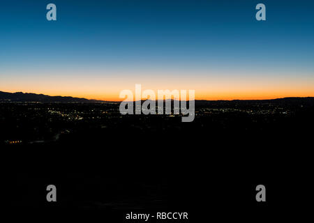 Predawn hilltop view of sprawling west San Fernando Valley neighborhoods in Los Angeles, California. Stock Photo