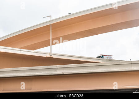 Miami, USA - May 2, 2018: Road street highway under construction on Palmetto Expressway in Florida with ramps interchange, trucks and cars Stock Photo