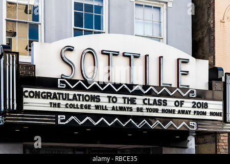 Charleston, USA - May 12, 2018: Downtown city King street in South Carolina with Sottile theatre and College of Charleston graduation sign Stock Photo