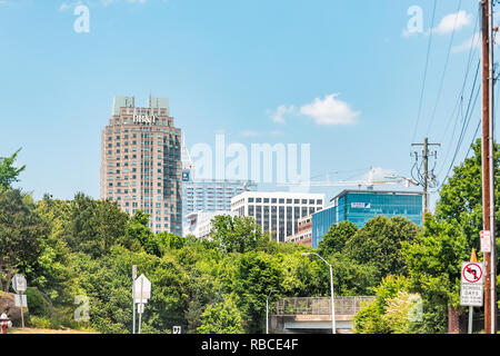 Raleigh, USA - May 13, 2018: Downtown North Carolina city skyscrapers, cityscape or skyline at day with modern buildings and businesses in summer Stock Photo