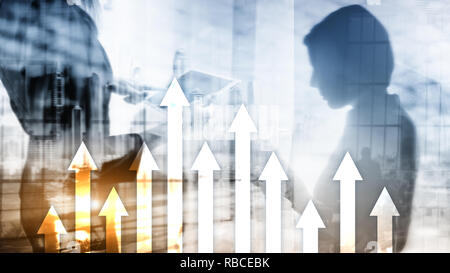 Up arrow graph on skyscraper background. Invesment and financial growth concept Stock Photo