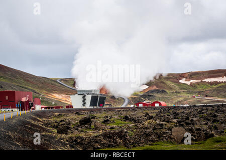 Krafla, Iceland - June 16, 2018: Kroflustod Power Station near Volcano and lake Myvatn using geothermal energy with road and pipes Stock Photo