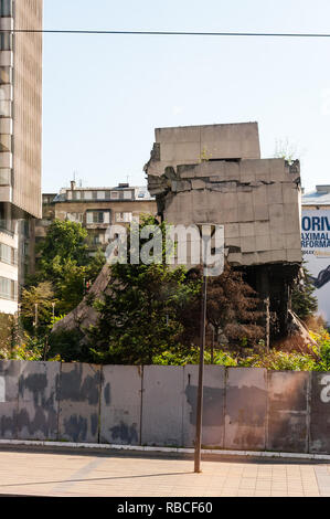 Belgrade, Serbia - June 09, 2013: View from autobus window on destroyed part of downtown building in Belgrade after airstrikes in civil war Stock Photo