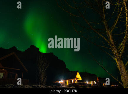 Northern lights dancing over the landscape of Iceland Stock Photo