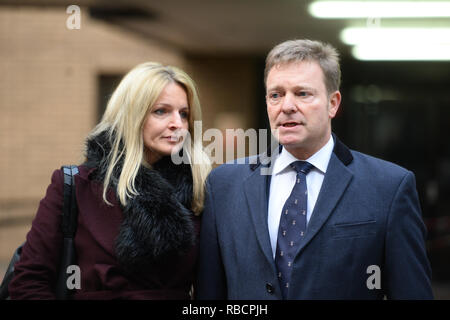 Conservative MP Craig Mackinlay with his wife Kati outside London's Southwark Crown Court after he was cleared of breaking electoral expenses rules in his 2015 general election campaign against then-Ukip leader Nigel Farage. Stock Photo
