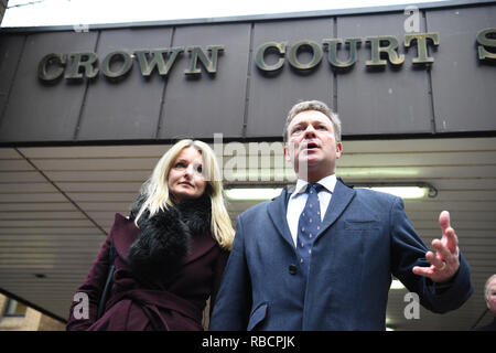 Conservative MP Craig Mackinlay with his wife Kati outside London's Southwark Crown Court after he was cleared of breaking electoral expenses rules in his 2015 general election campaign against then-Ukip leader Nigel Farage. Stock Photo