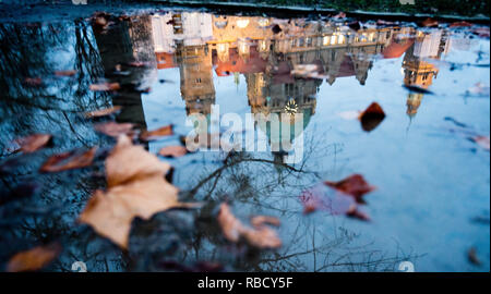 Hannover, Germany. 09th Jan, 2019. The new town hall is reflected in a puddle of rain. Credit: Julian Stratenschulte/dpa/Alamy Live News Stock Photo
