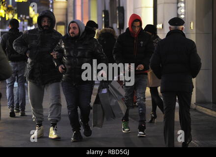 Milan, Sfera Ebbasta walks in the center The famous rapper SFERA EBBASTA  surprised to walk through the streets of the center. Here he is with  friends walking in Via Montenapoleone Stock Photo 