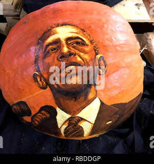 NEW YORK, USA: Barrack Obama. THESE SPOOKTACULAR pumpkin carvings featuring intricate designs that took up to SIXTEEN-HOURS to perfect are sure to get you into the Halloween spirit. Stunning pictures show how the artist has carved a terrifyingly accurate Giger inspired Alien into the seasonal fruit, while some pumpkins depict Ghost Busters and the witches from Hocus Pocus. Other pumpkins have been emblazoned with the Hulk from the 2017 hit film, Thor: Ragnarok, Disney’s Moana and Star Wars’ Darth Vader in front of the Death Star. The Governor from zombie-series The Walking Dead, Barrack Obama  Stock Photo