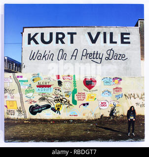 The cover of Walkin On A Pretty Daze by Kurt Vile. 2013 album on