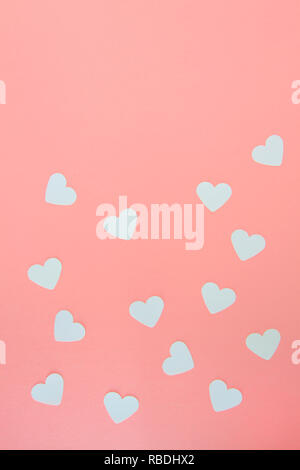 White paper hearts on pink background with copy space Stock Photo