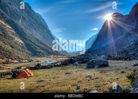 Sunrise in Taulliraju mountain range in Peru as seen during the Santa Cruz Trek. Stock Photo