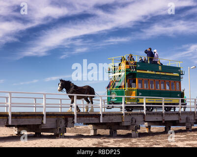 Historic horse-drawn tram crossing the 600-metre causeway from Victor Harbor to Granit Island Stock Photo
