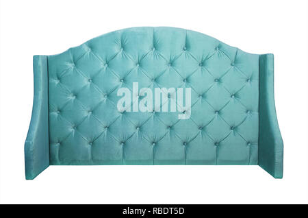 Shaped pastel teal blue color soft velvet fabric capitone bed headboard of Chesterfiels style sofa isolated on white background, front view Stock Photo