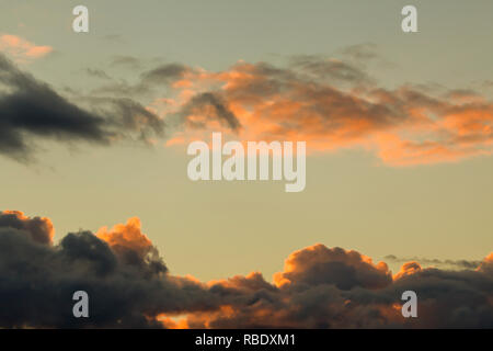 Dark clouds and clear sunset sky. Dramatic skies in Norfolk Stock Photo