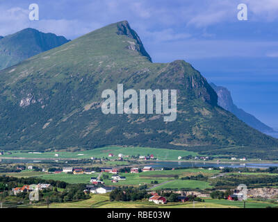 Lofoten valley near Leknes, agricultural area, farm land and spread red houses, island Ausvagöy, Lofoten, Norway Stock Photo