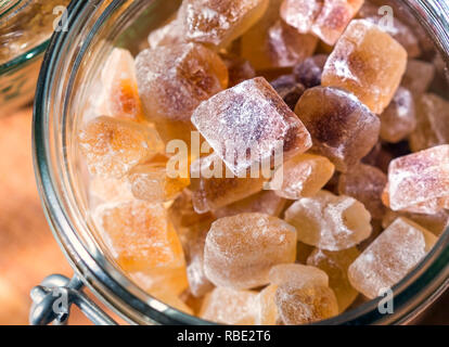 rock candy sugar in glass close-up Stock Photo