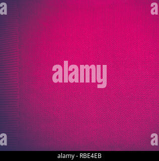 Purple  fuchsia magenta  Knitted pattern wool sweater texture close up. Handmade purple knitting wool texture background Stock Photo