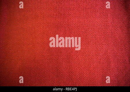 Orange Brown Terracotta Knitted pattern wool sweater texture close up. Handmade orange brown knitting wool texture background Stock Photo