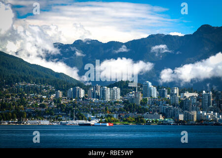 The skyline of North Vancouver on a bright sunny day in the fall. Stock Photo