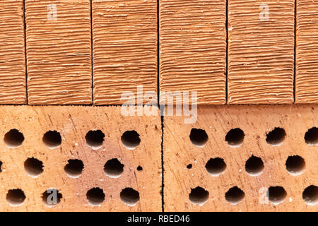 construction material - ordinary red bricks Stock Photo