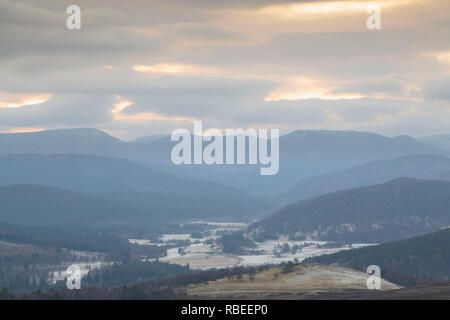 A View Over Royal Deeside Looking West (with Balmoral Castle in the Lower Left Corner of the Image) from the Maim on a Winter Afternoon Stock Photo