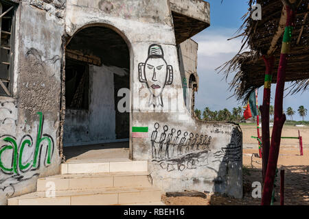 Drawings on an abandoned resort on the infamous beachfront gateway port to slavery by the Door of no-return. Ouidah, Benin. Stock Photo