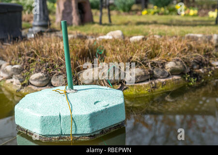 ice preventers, garden pond Stock Photo