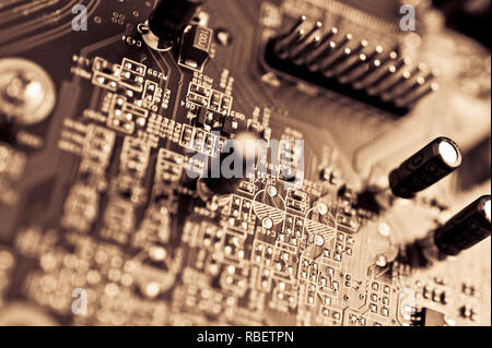 detail of a computer motherboard or printed circuit board containing the principal components of a computer Stock Photo