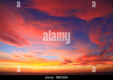 Dramatic, bright, Red, orange, pink, blue, sky, skies, after sunset, cloud, clouds, formation, multi colour, colours Stock Photo