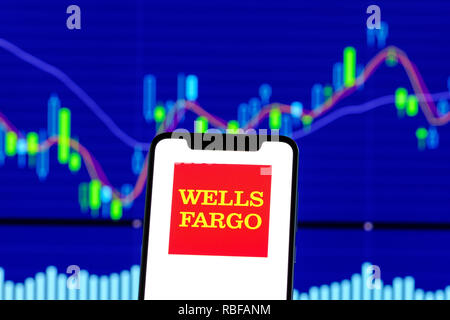 Hong Kong, China. 28th Dec, 2018. Wells Fargo logo is seen on an android smartphone over stock chart. Credit: Daniel Fung/SOPA Images/ZUMA Wire/Alamy Live News Stock Photo