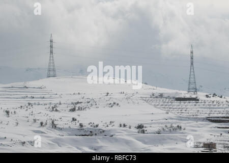 Beirut, Lebanon. 10th Jan, 2019. Antenna Masts on top of snowy landscape as the recent severe weather form Storm Norma has brought heavy snowfall to the mountain areas and villages east of Beirut Credit: amer ghazzal/Alamy Live News Stock Photo