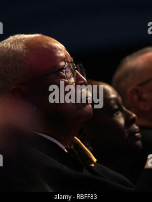 New York City Mayor David Dinkins, with bullhorn, appeals to an angry ...