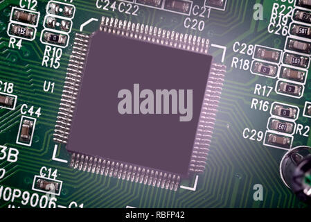 Close-up of Electronic chip in a computer circuit board. Stock Photo