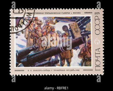 Postage stamp from the Soviet Union depicting the Lansere painting Soldiers Inspecting Captured Artillery. Stock Photo