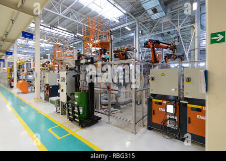 Car manufacturing plant. Automotive shop. The Assembly line for manufacturing cars. Stock Photo