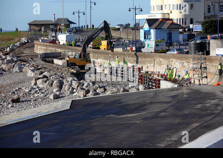 The town of Porthcawl with its new sea defences being built for protection against the Atlantic sea waves battering the towns defences. Stock Photo
