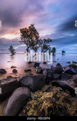 Peaceful sunset over Labuan, Banten, Indonesia Stock Photo