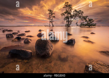 Mystical sunset over Labuan, Indonesia Stock Photo