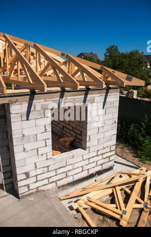 Roofing  house construction with autoclaved aerated concrete (AAC), also known as autoclaved cellular concrete (ACC), autoclaved lightweight concrete  Stock Photo