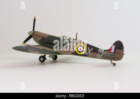 Supermarine Spitfire die-cast mini model, world war 2 airplane replica on white background Stock Photo