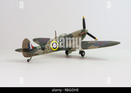 Supermarine Spitfire die-cast mini model, world war 2 airplane replica on white background Stock Photo