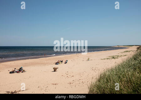 GREENWICH, PRINCE EDWARD ISLAND, CANADA - July 9, 2018: Tourists visit the Greenwich beach in the Prince Edward Island National Park (Greenwich). Stock Photo