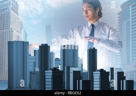Futuristic architect doing urban planning Stock Photo