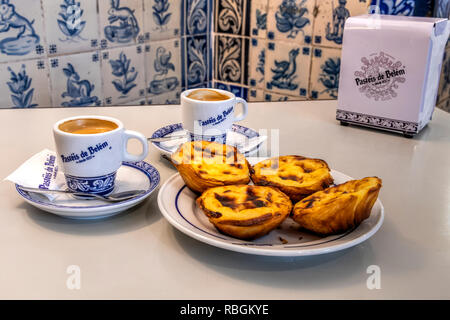 Pastel de belem or pasteis de nata custard tarts served with a cup of coffee at the historical Pasteis de Belem cafe in Belem, Lisbon, Portugal Stock Photo