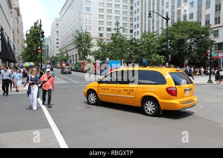 WASHINGTON, USA - JUNE 14, 2013: People cross the street in Washington DC. 646 thousand people live in Washington DC (2013) making it the 23rd most po Stock Photo