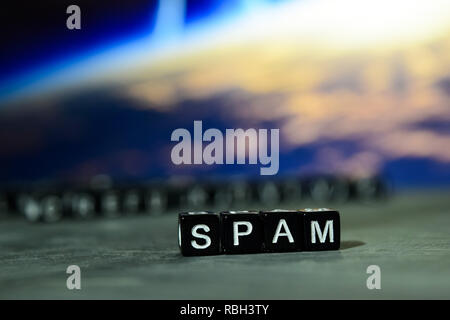 Spam on wooden blocks. Cross processed image with bokeh background Stock Photo