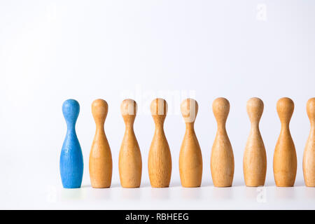 wooden figure stands out from the crowd. Business leadership concept Stock Photo