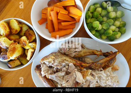 Typical Christmas Dinner with turkey, roast veg and brussel sprouts Stock Photo